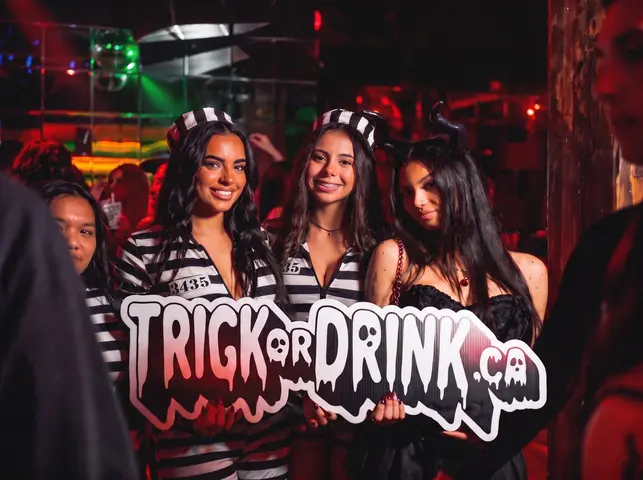 Trick or Drink partygoers in costume, Toronto