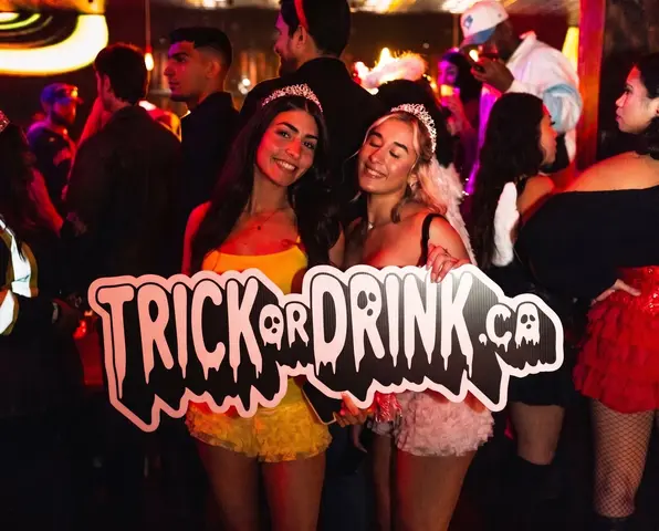 Trick or Drink partygoers in costume, Toronto